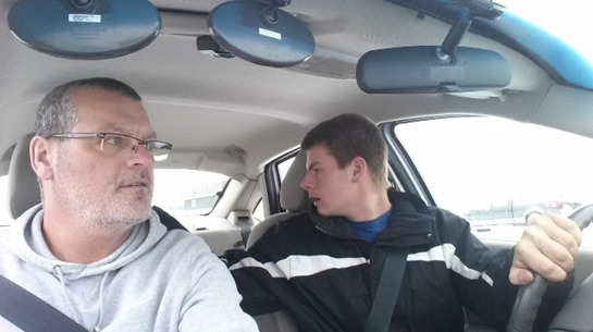 Driver instructor with student