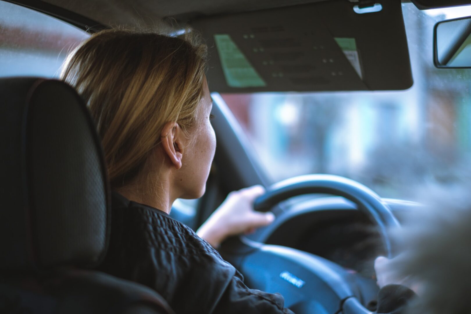 woman driving student